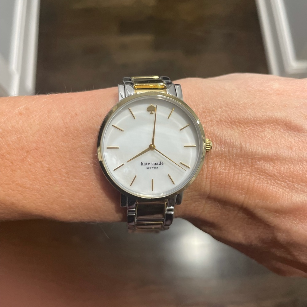 Women’s white and yellow gold Kate Spade watch